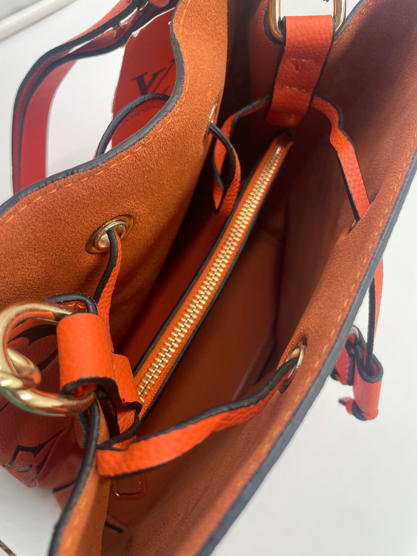 Louis Vuitton orange Bucket bag