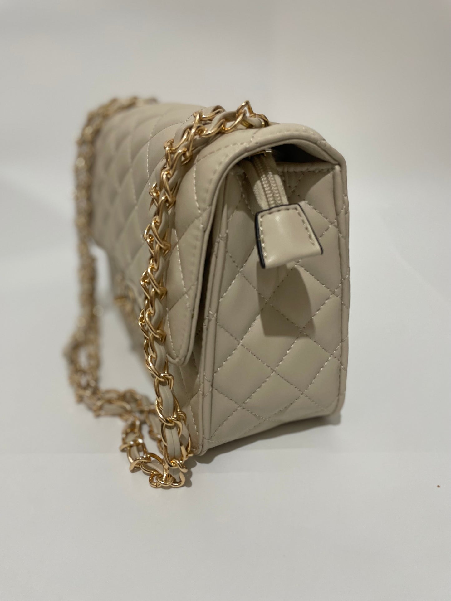 Cream channel quilted chain shoulder crozzbody bag