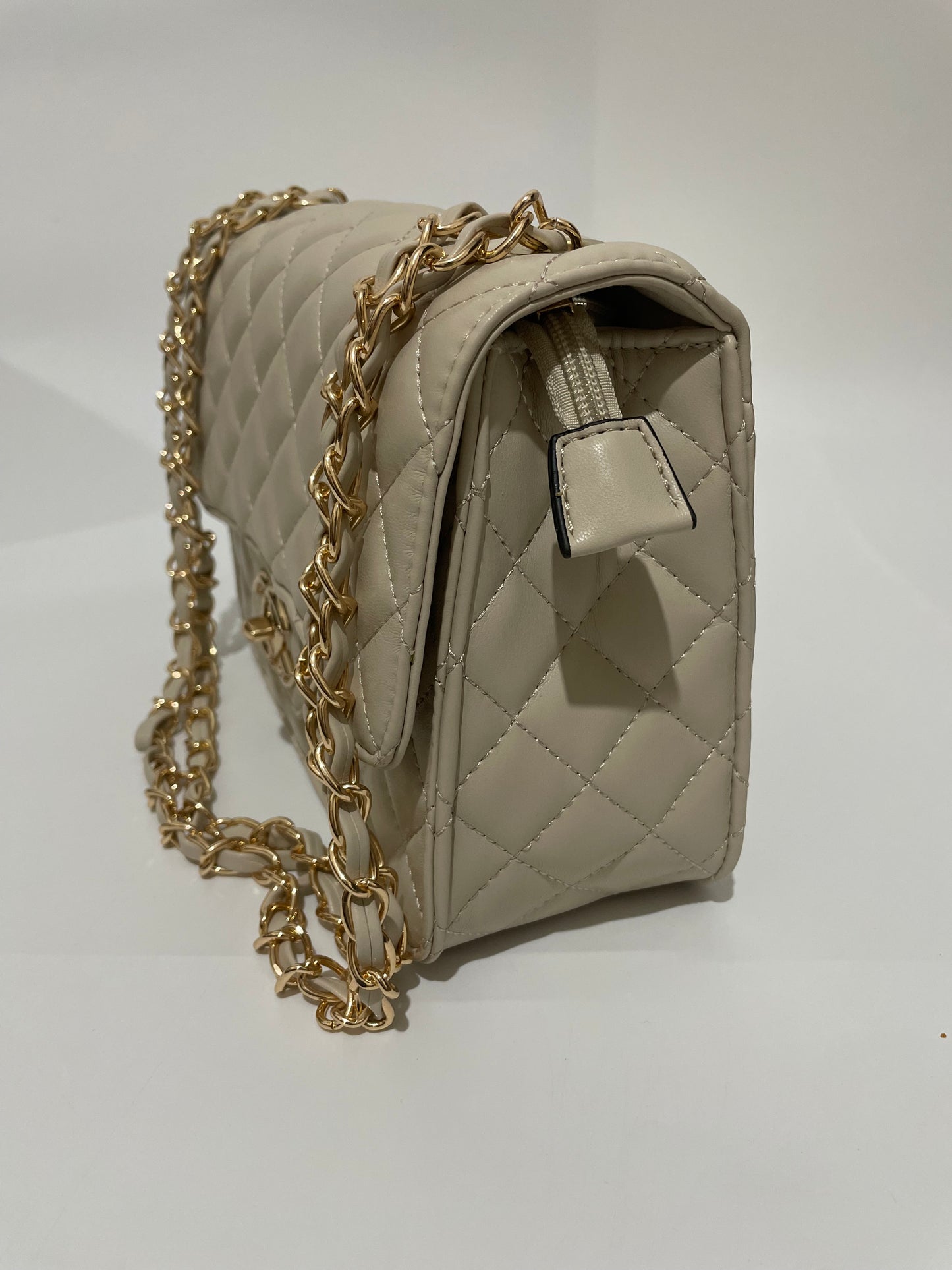 Cream channel quilted chain shoulder crozzbody bag
