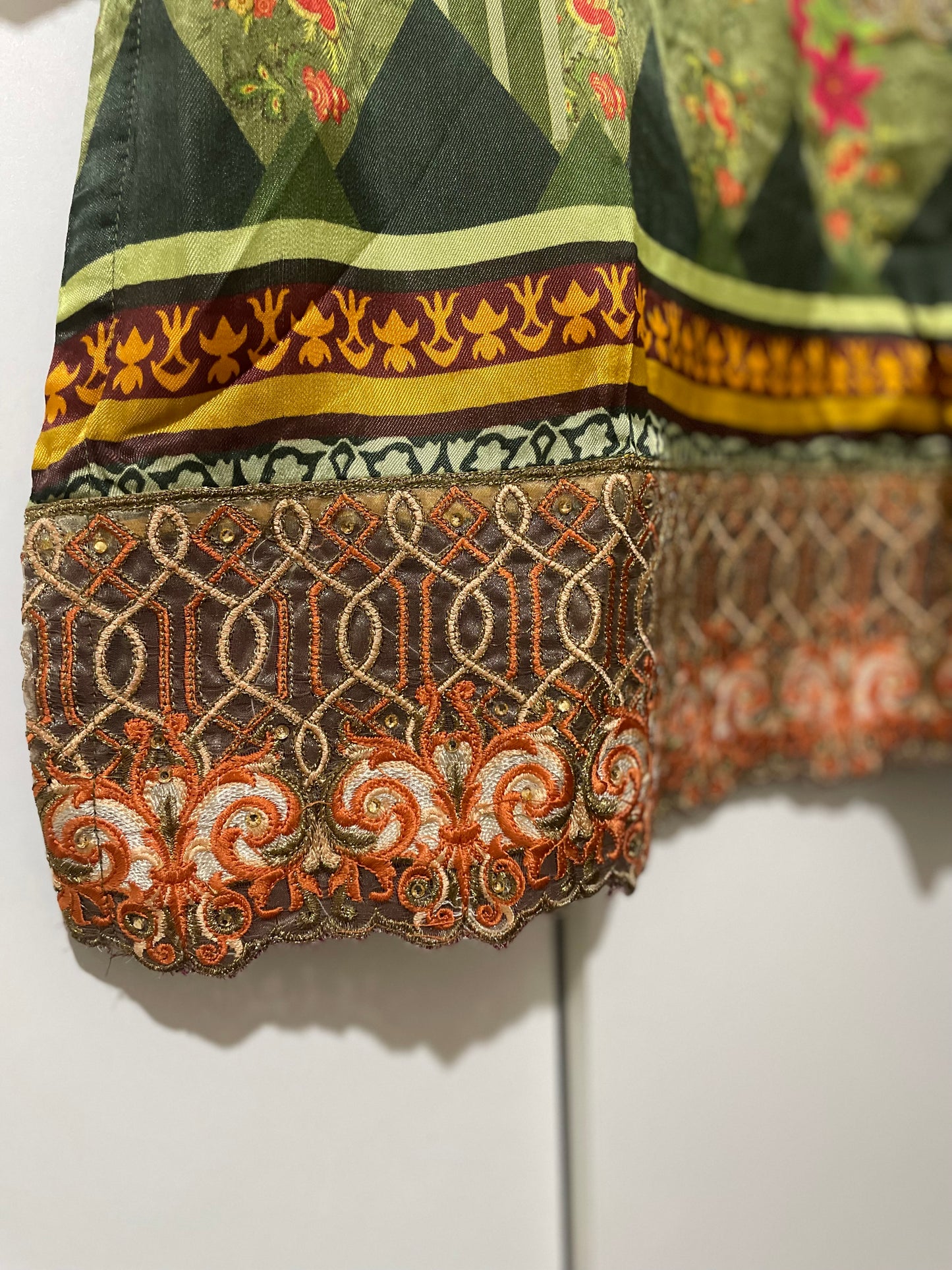 Nouroze Satin raw silk green embroidery kurta net lace border