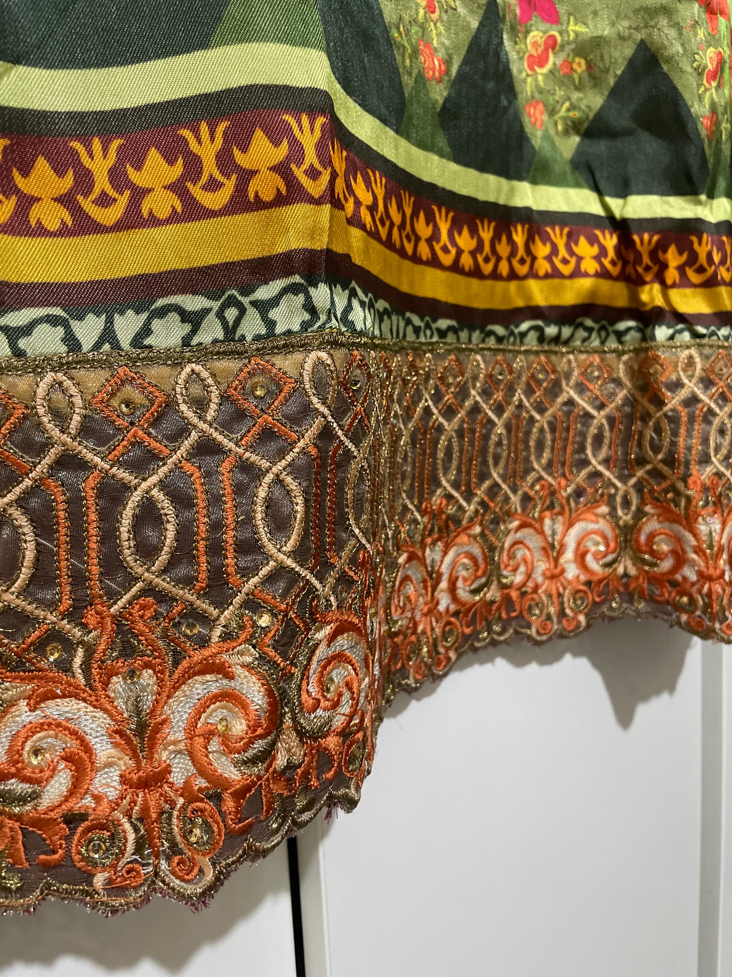 Nouroze Satin raw silk green embroidery kurta net lace border